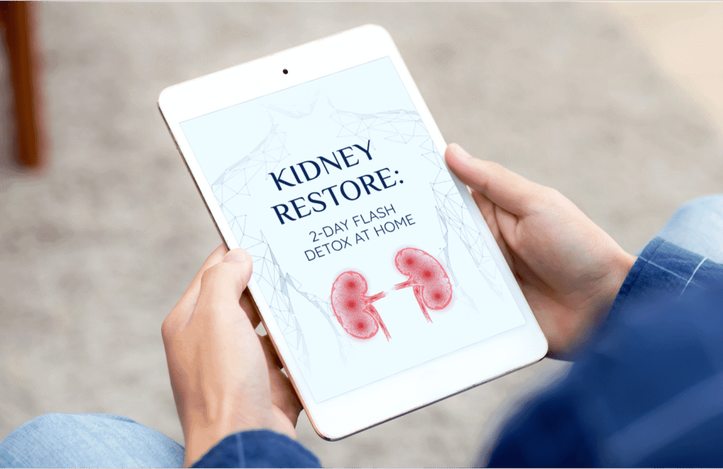 A person holding a white tablet displaying the digital e-book bonus cover titled Kidney Restore 2-Day Flash Detox at Home with an illustration of kidneys.
