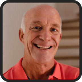 Close-up profile of a smiling, happy senior man with a bald head, representing a satisfied user of Prostadine prostate health supplement.